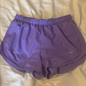 Purple Nike shorts
